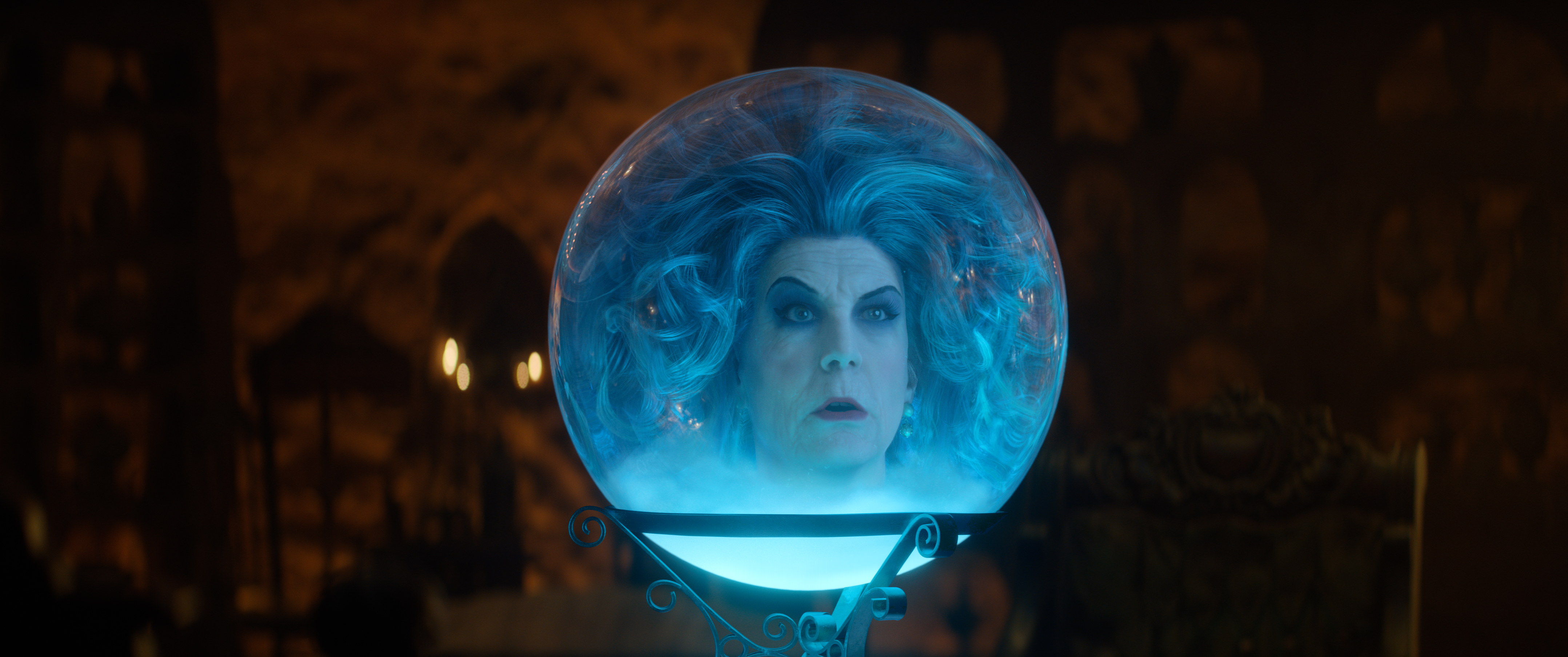 Jamie Lee Curtis as Madame Leota, a floating head in a crystal ball