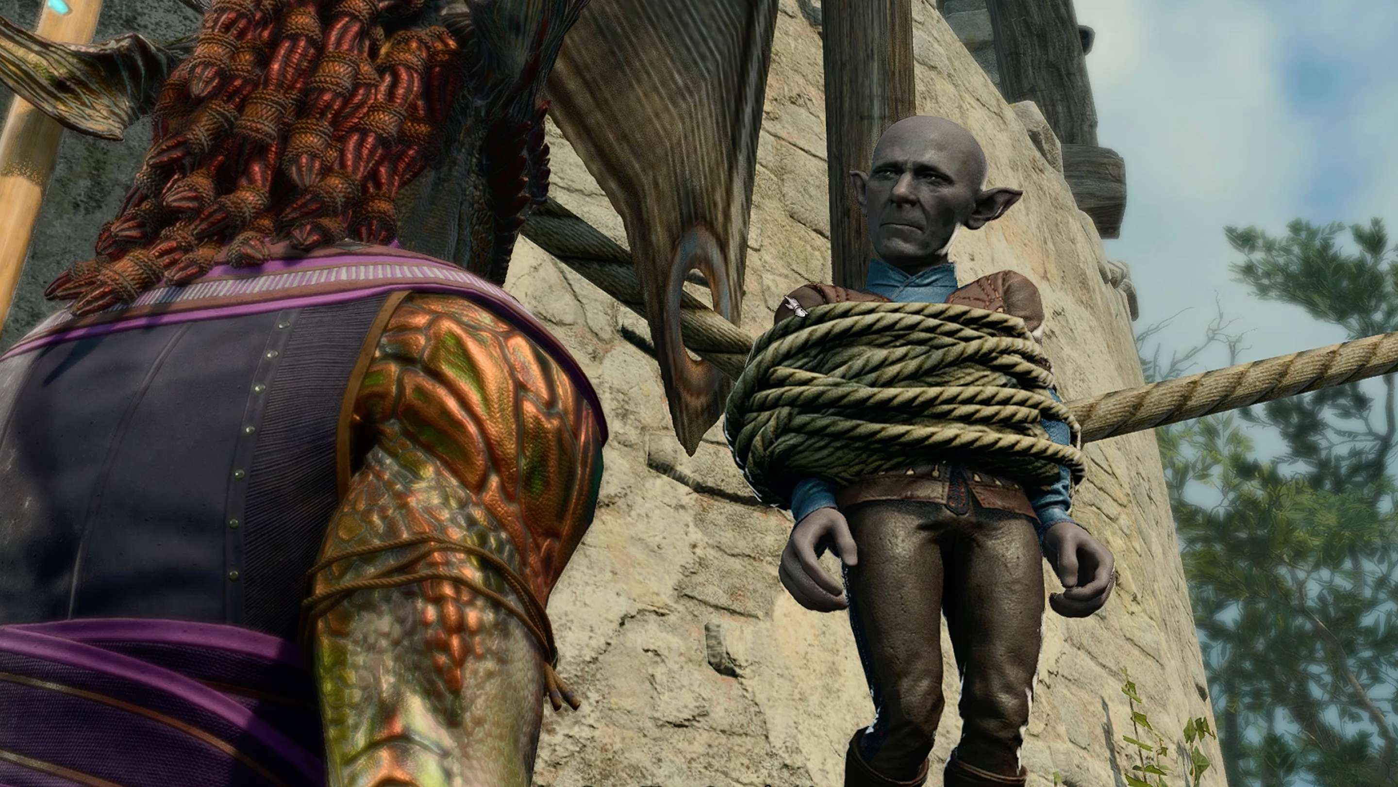 Barcus Wroot, a Deep Gnome, tied to a windmill blade in Baldur’s Gate 3.